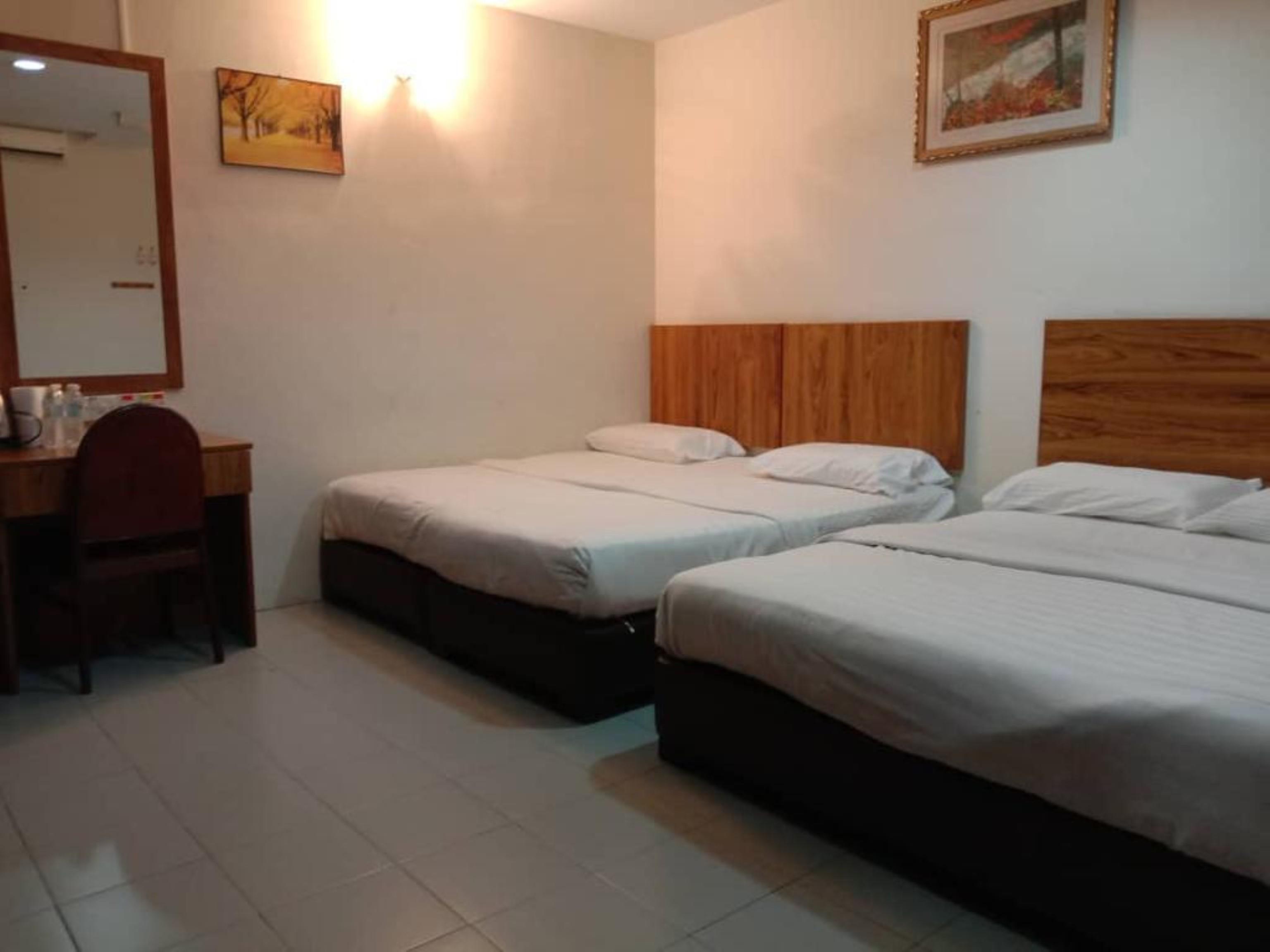 Oyo 89877 Sun Triang Hotel Kampong Kerayong Exteriör bild